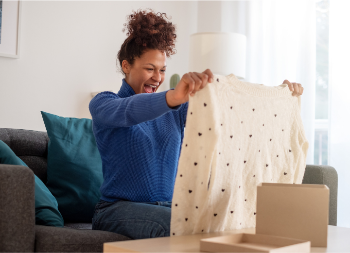 A cart.com customer opening a packing from a fulfillment facility 